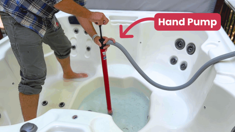 Hand Pumping Water From Hot Tub Foot Well