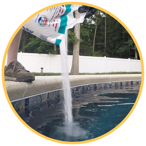 Pouring Salt Into An Inground Pool