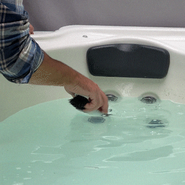 Scrubbing Inside The Hot Tub